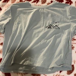 Never worn mountain designed shirt.